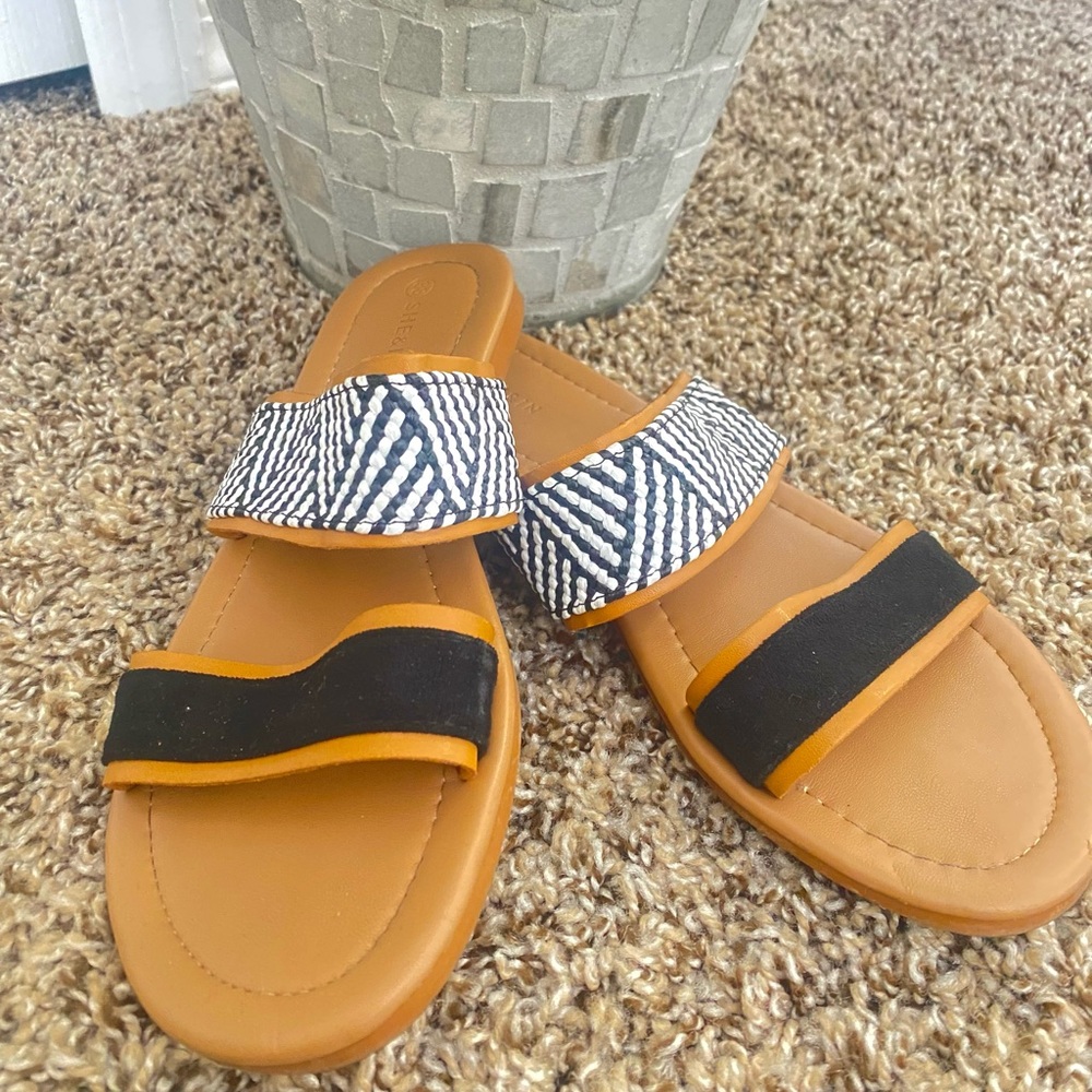 “It’s black it’s white” Sandals